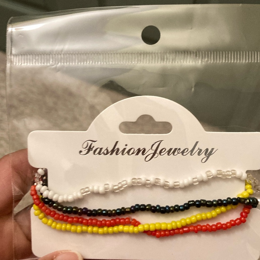 Set of 4 Stretchy anklets.  NWT.. handmade.